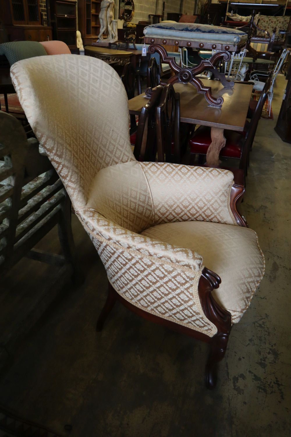 A 19th century French mahogany spoonback armchair